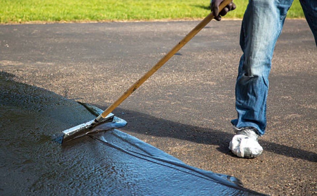 Driveway repair and seal coating close-up view