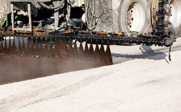 Asphalt chip sealing and road surface maintenance