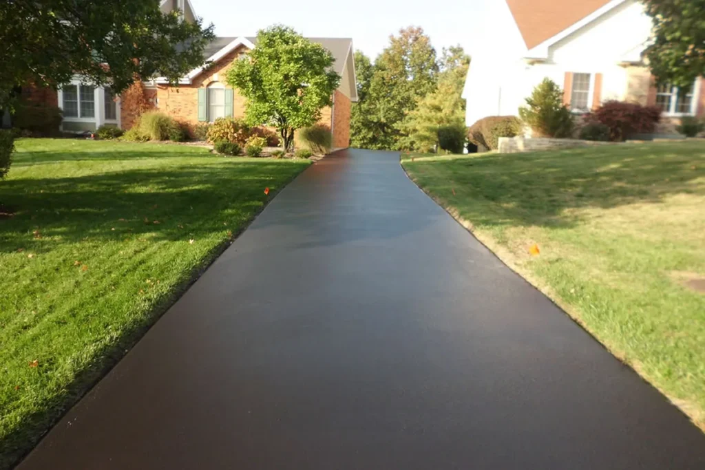 Freshly sealed residential driveway showcasing the quality and lasting protection of Driveway Sealing Services.