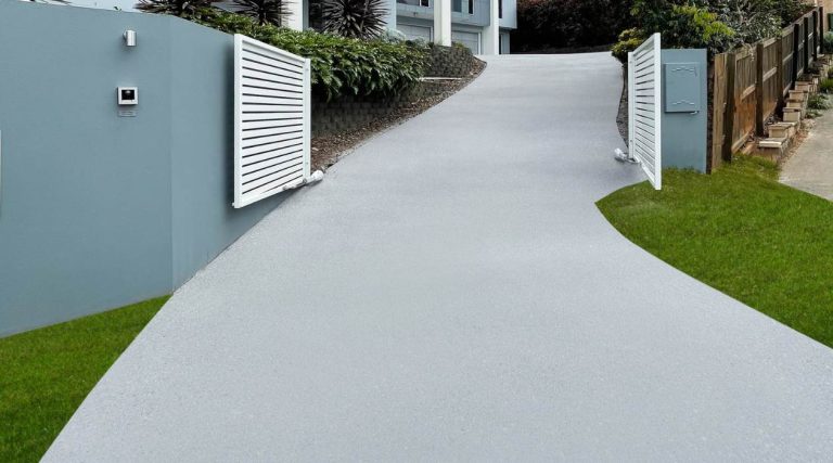 Concrete Driveway Resurfacing creates a smooth, durable, modern finish that instantly enhances the curb appeal of this residential driveway.